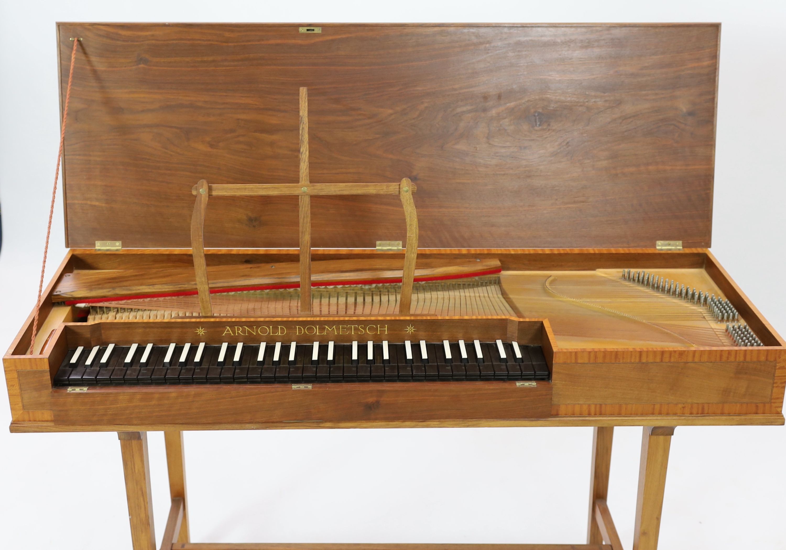 An Arnold Dolmetsch of Haslemere clavichord, width 128cm depth 44cm height 76cm